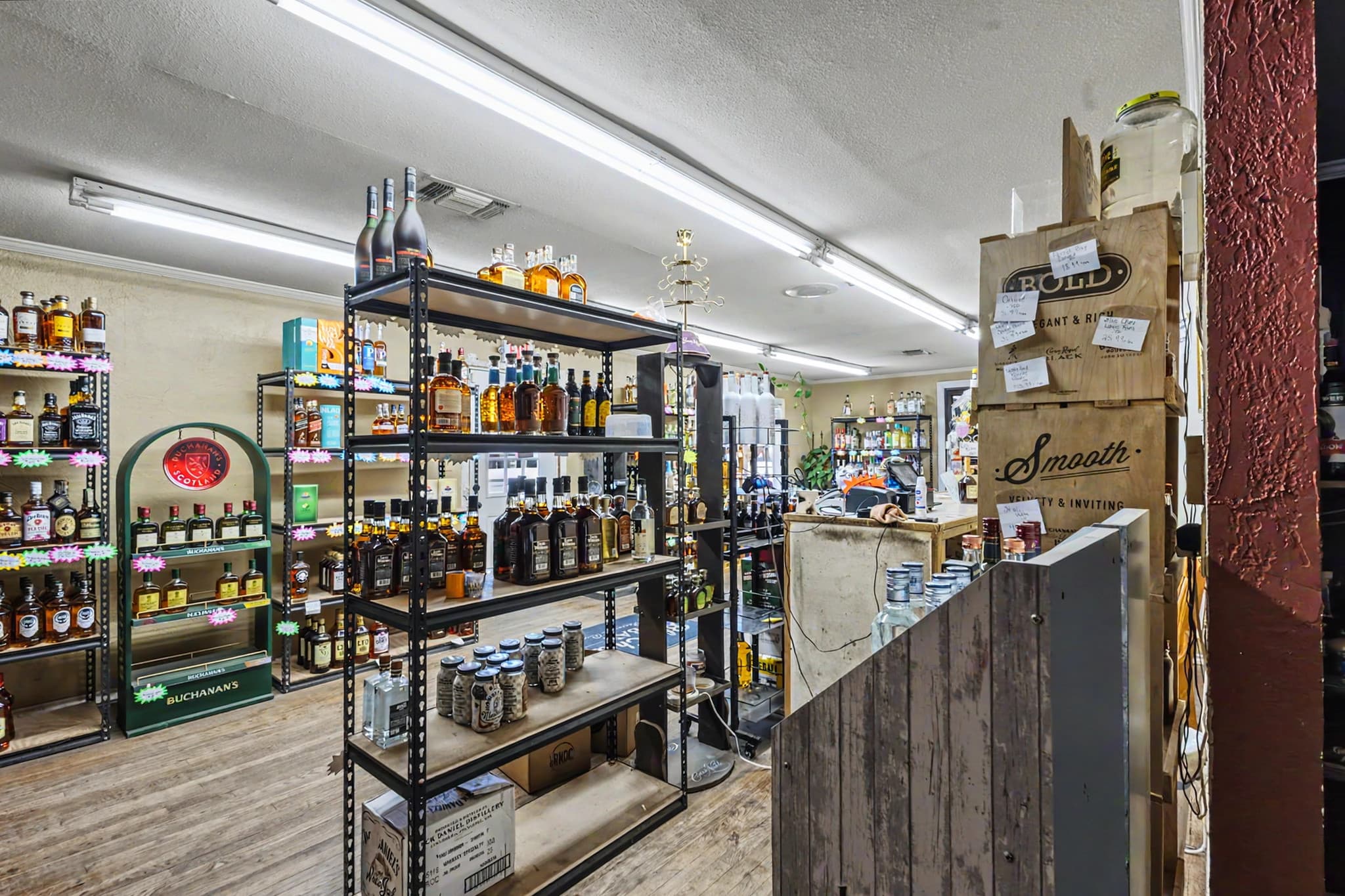 Interior detail shot of Unit 2 at the Muleshoe Art Loft Airbnb showing styled retail shelving and interior finishes.