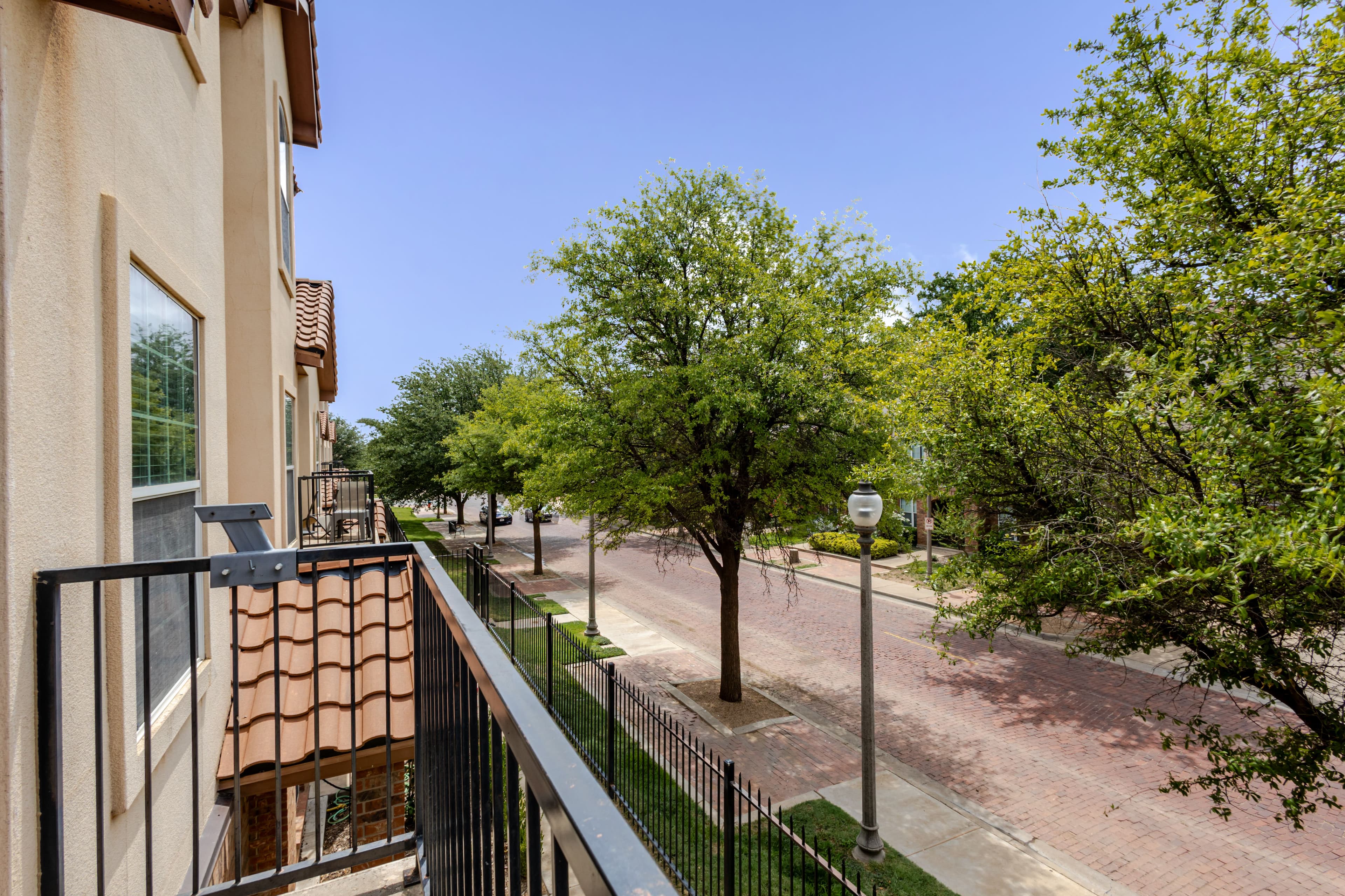 Exterior shot of balcony of Main Street Lubbock Airbnb Condo