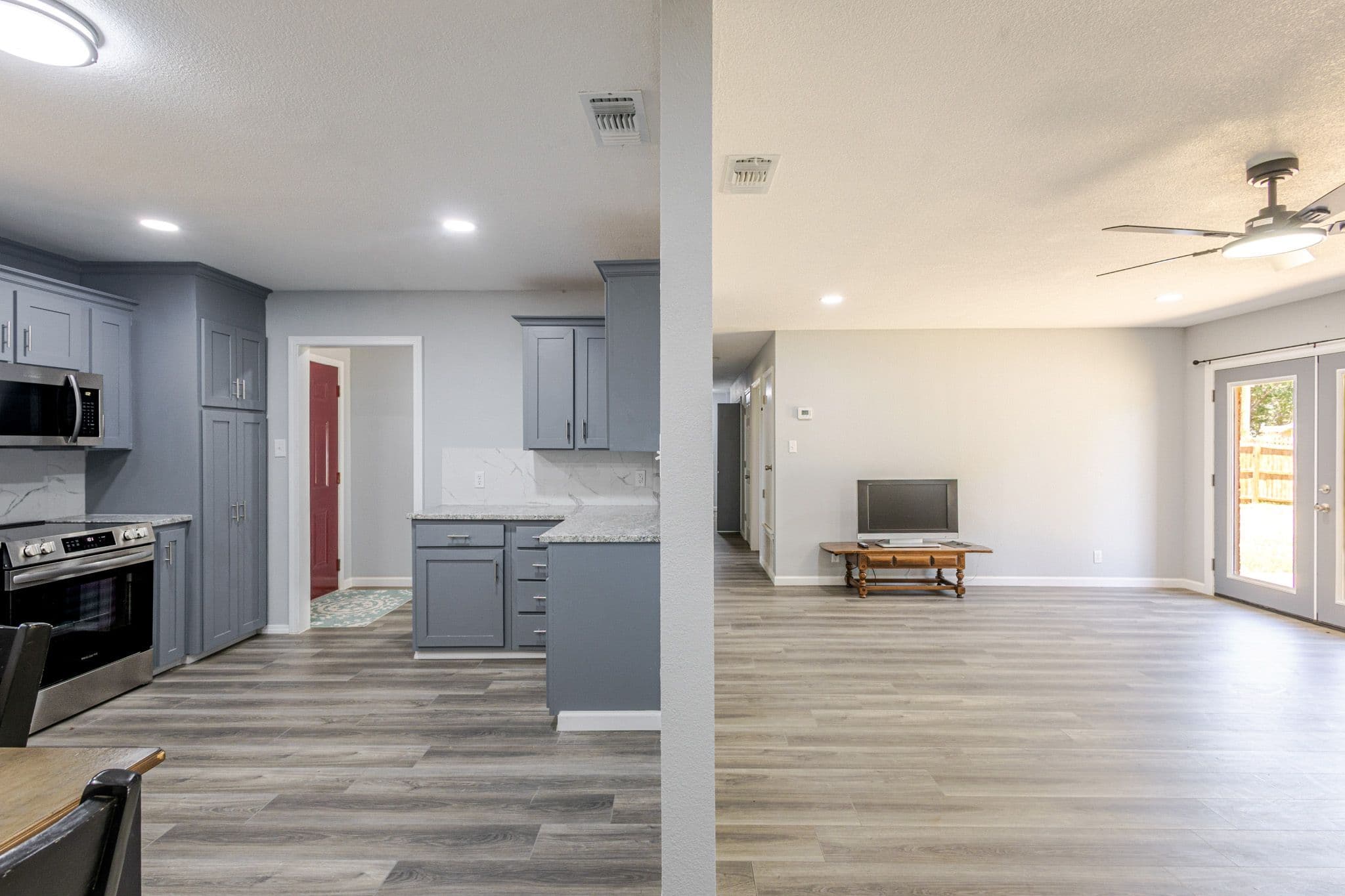 Interior shot of both the kitchen and livingroom