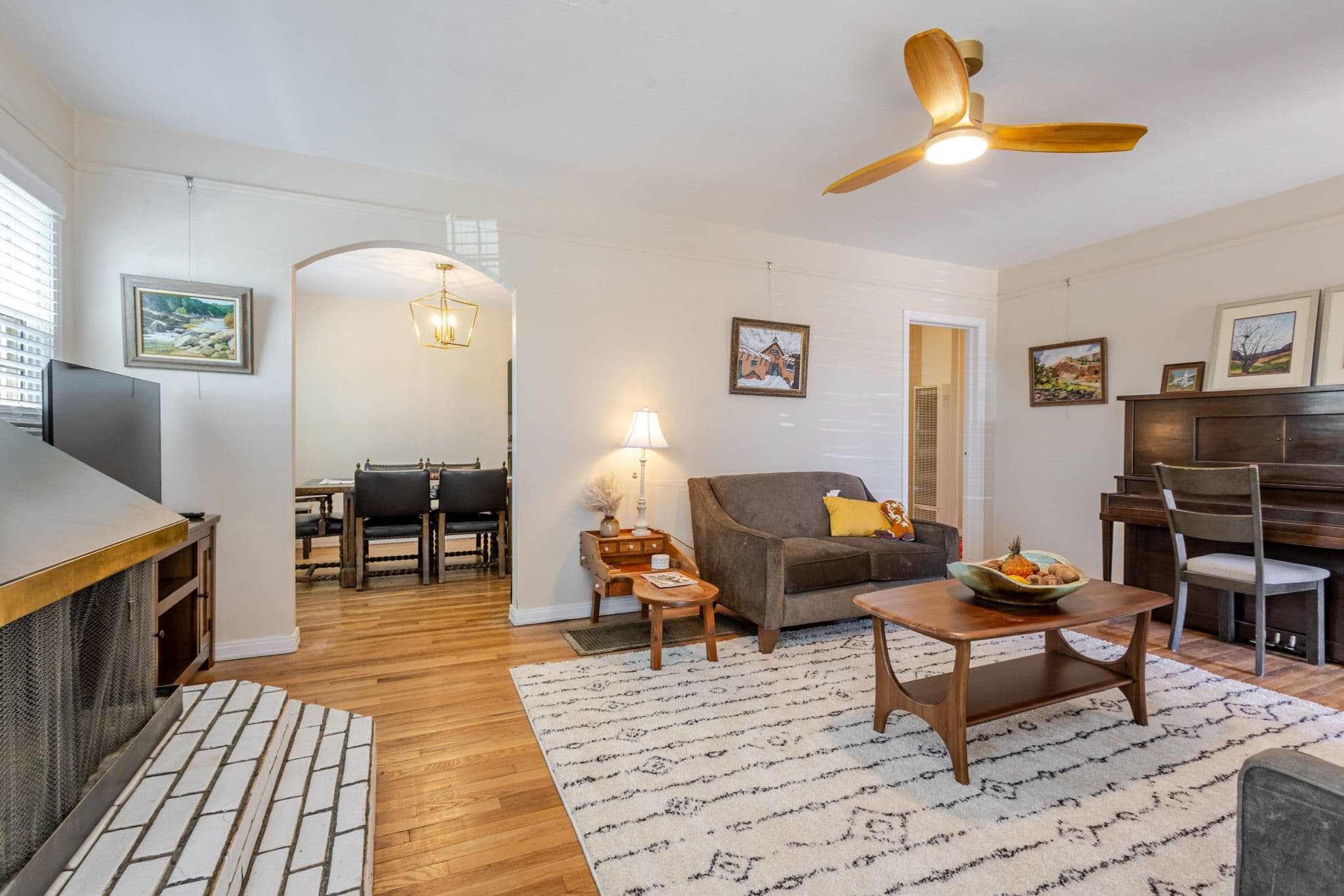 Interior shot slightly angled to the right of the living room facing the back of the house. Airbnb located in Clovis, New Mexico.