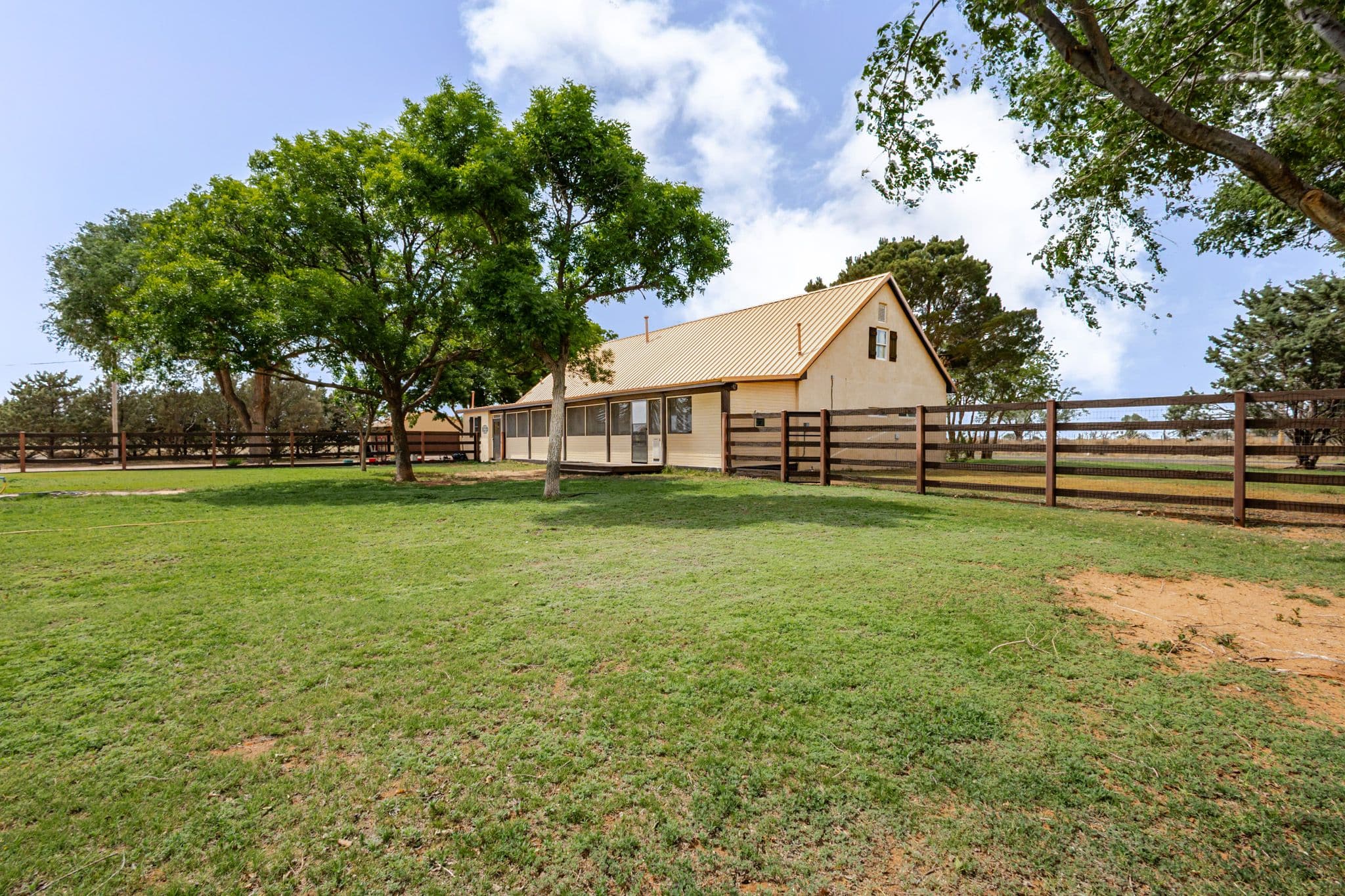Exterior backyard shot of countryside home located in Clovis NM.