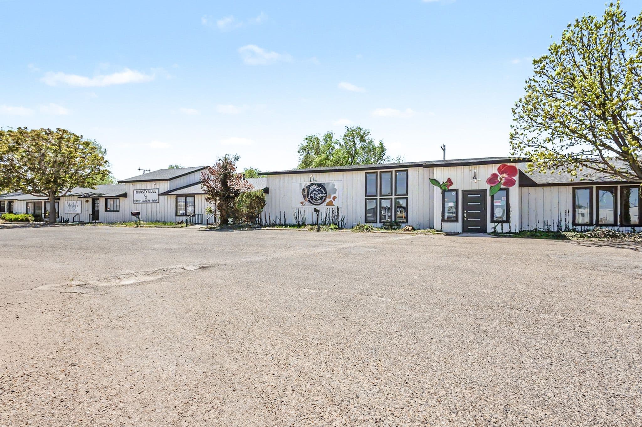 Exterior of the Muleshoe Art Loft Airbnb, a short-term rental on a quiet street in Muleshoe, TX.