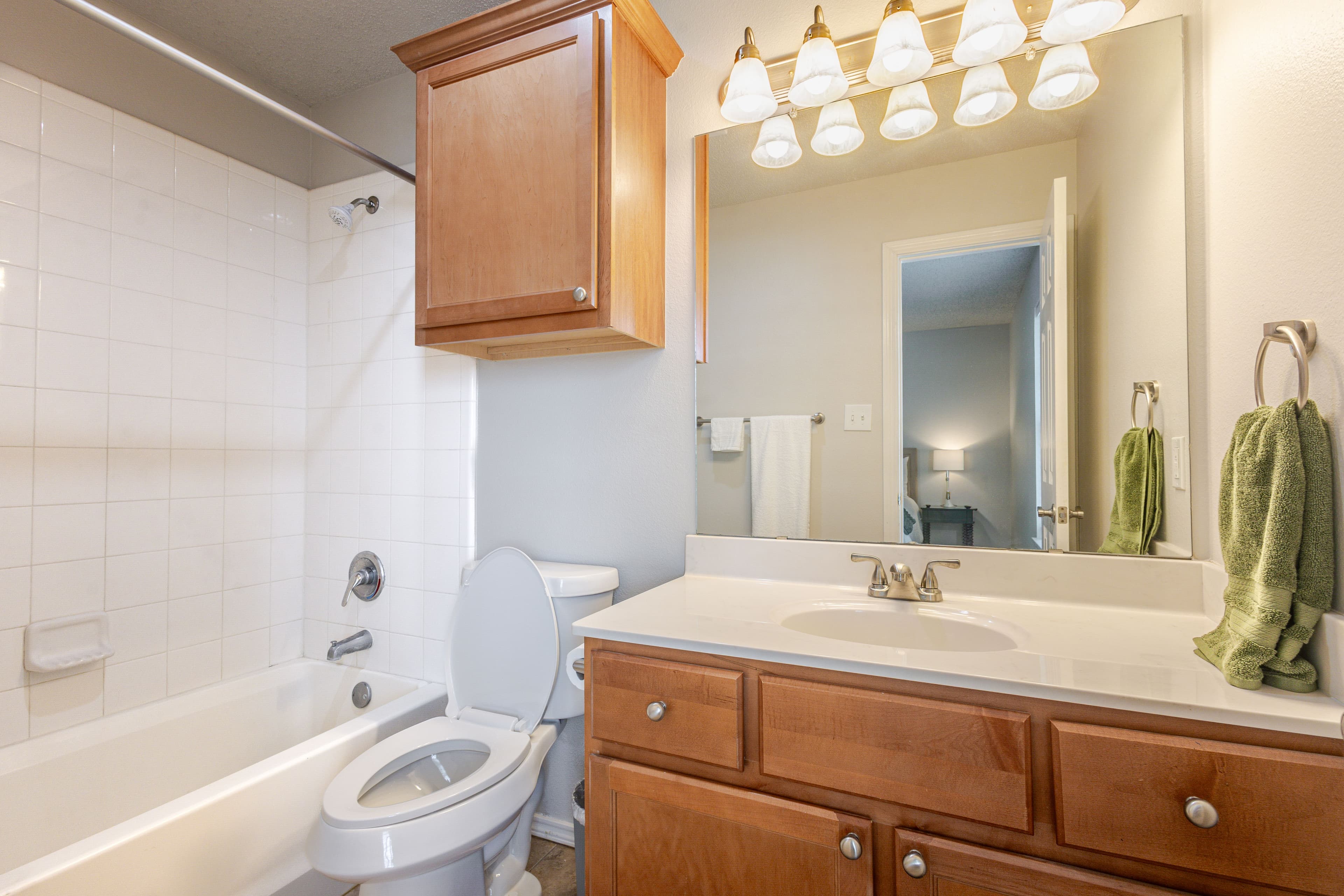 Interior shot of guest bathroom of lubbock airbnb condo on main street