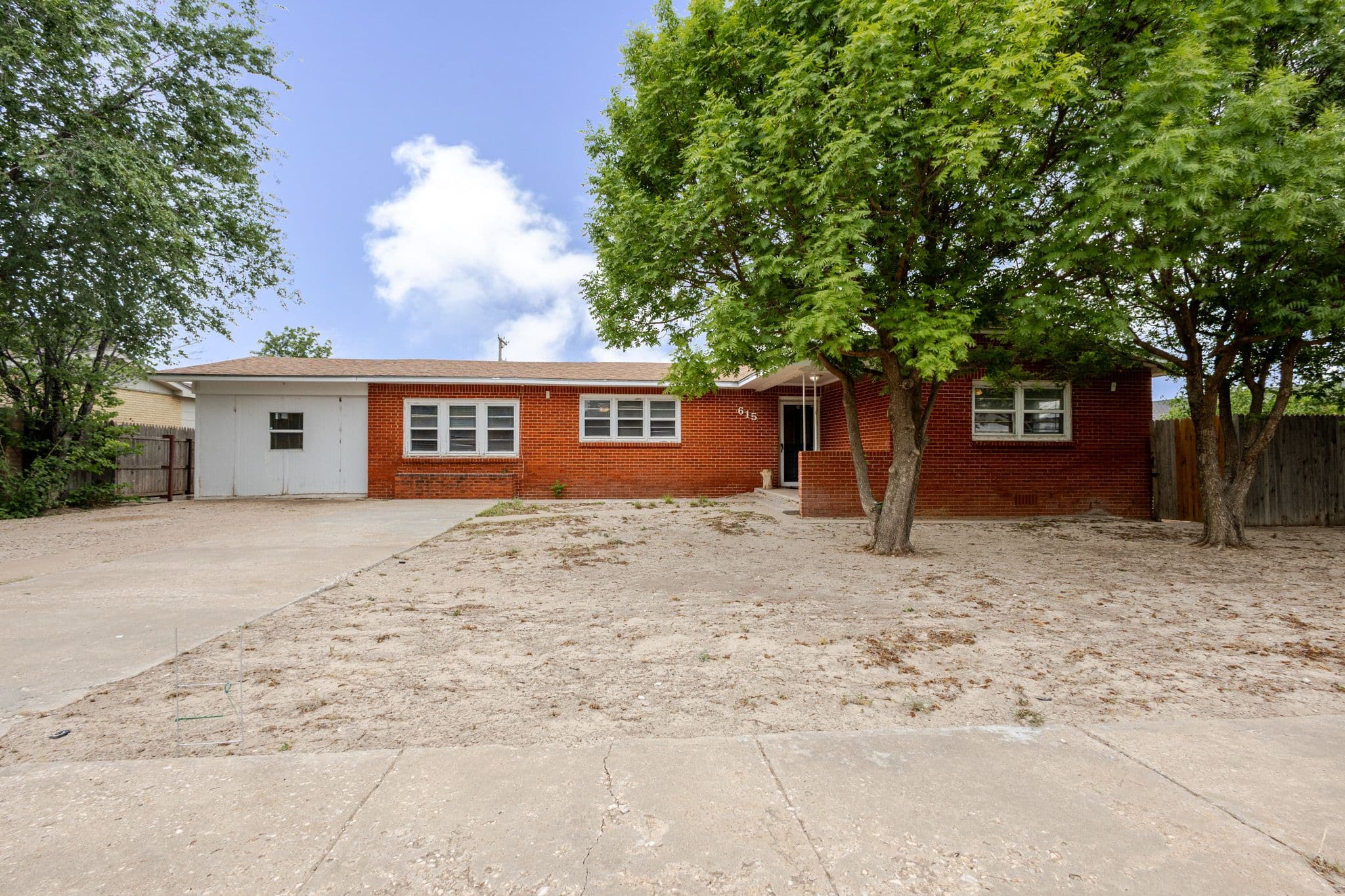 Exterior shot of home facing the front. Home located in Muleshoe TX