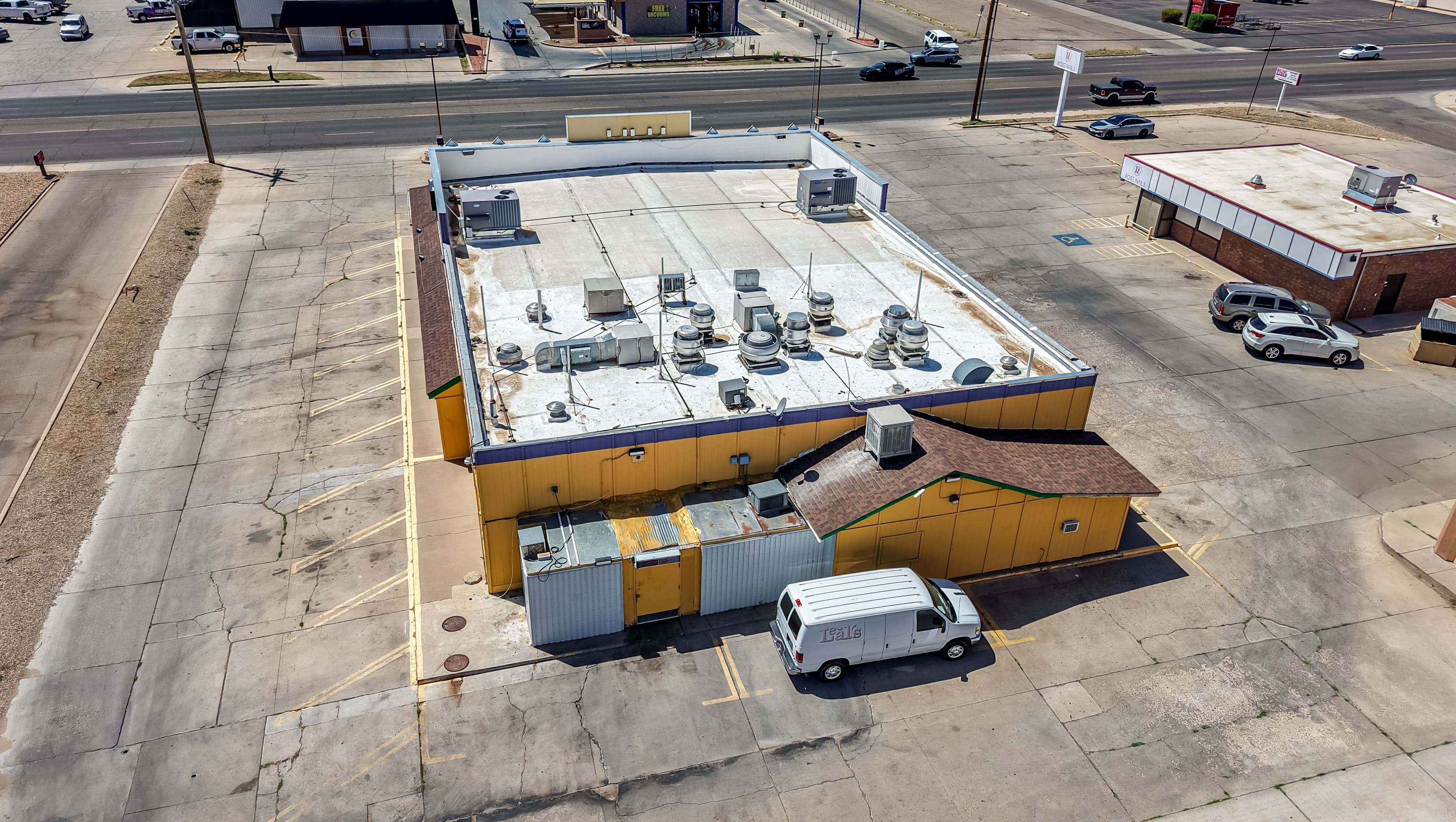Exterior shot of the back of commercial property of 2115 Prince