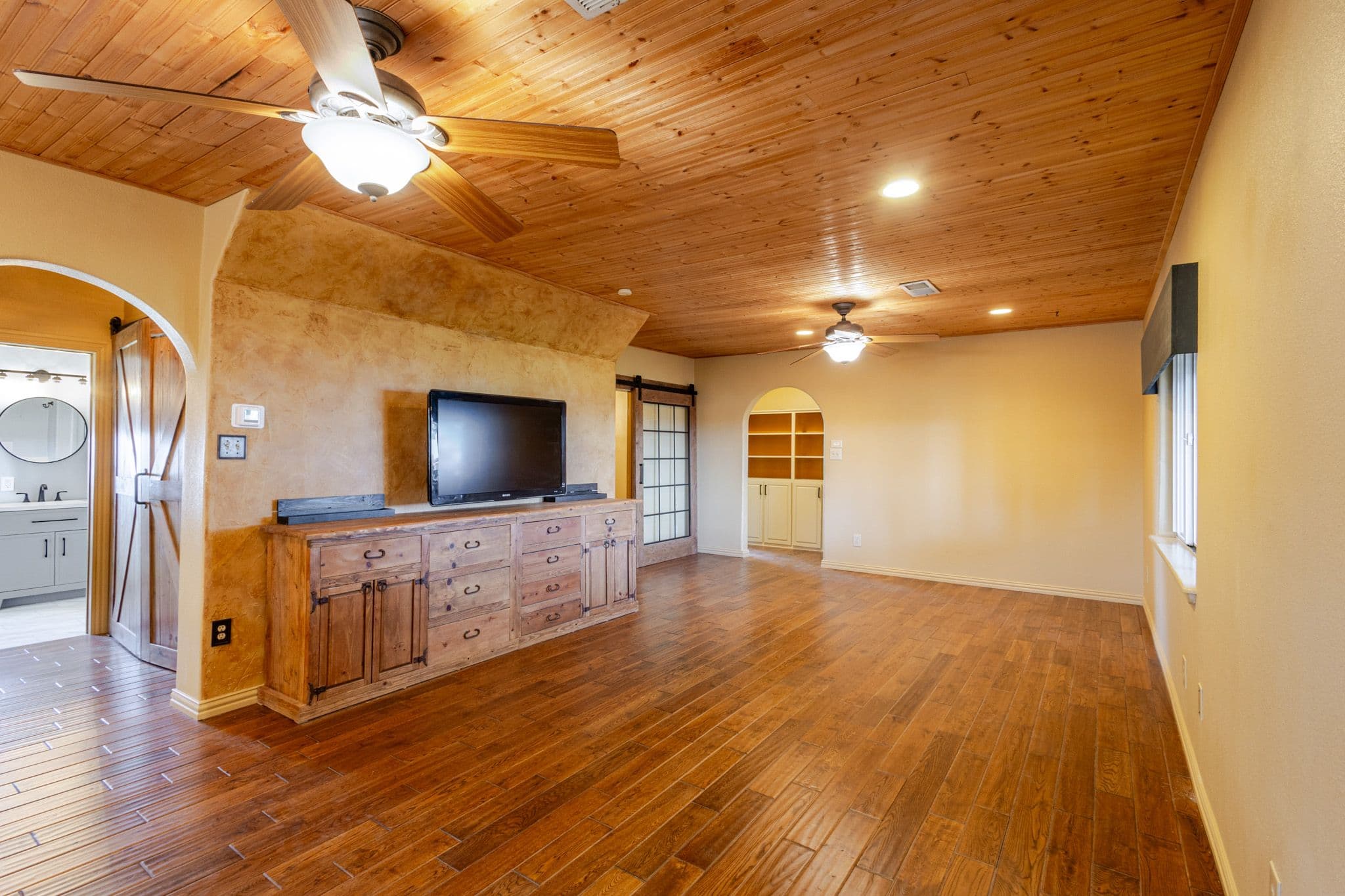 Interior corner view shot of living room of countryside home in Clovis, NM.