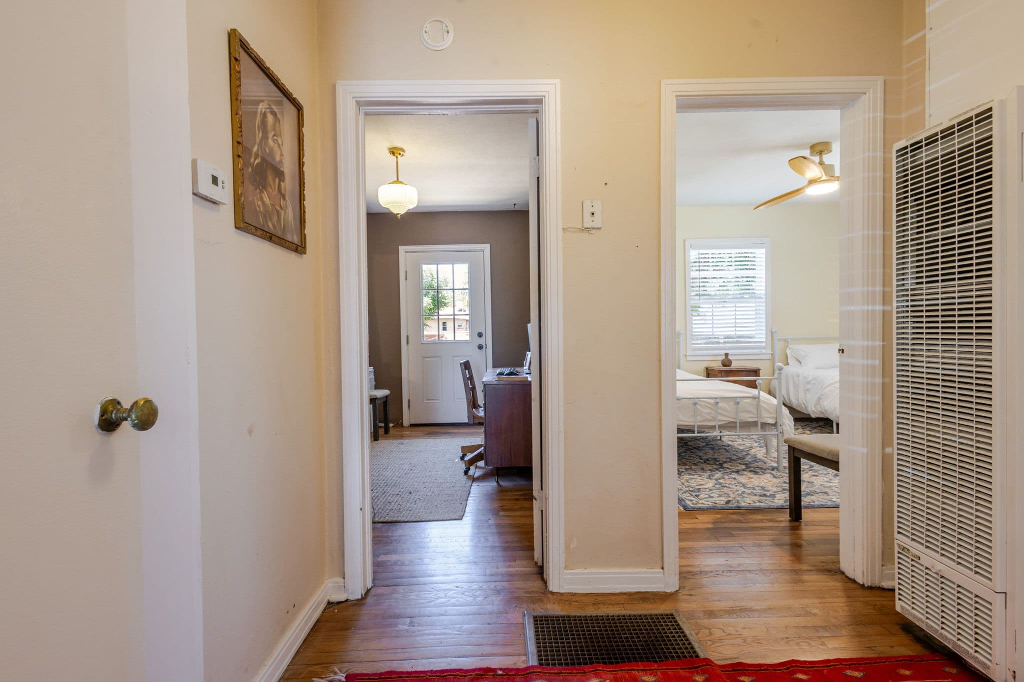 Interior shot of hallway showing two door ways. Airbnb located in Clovis New Mexico