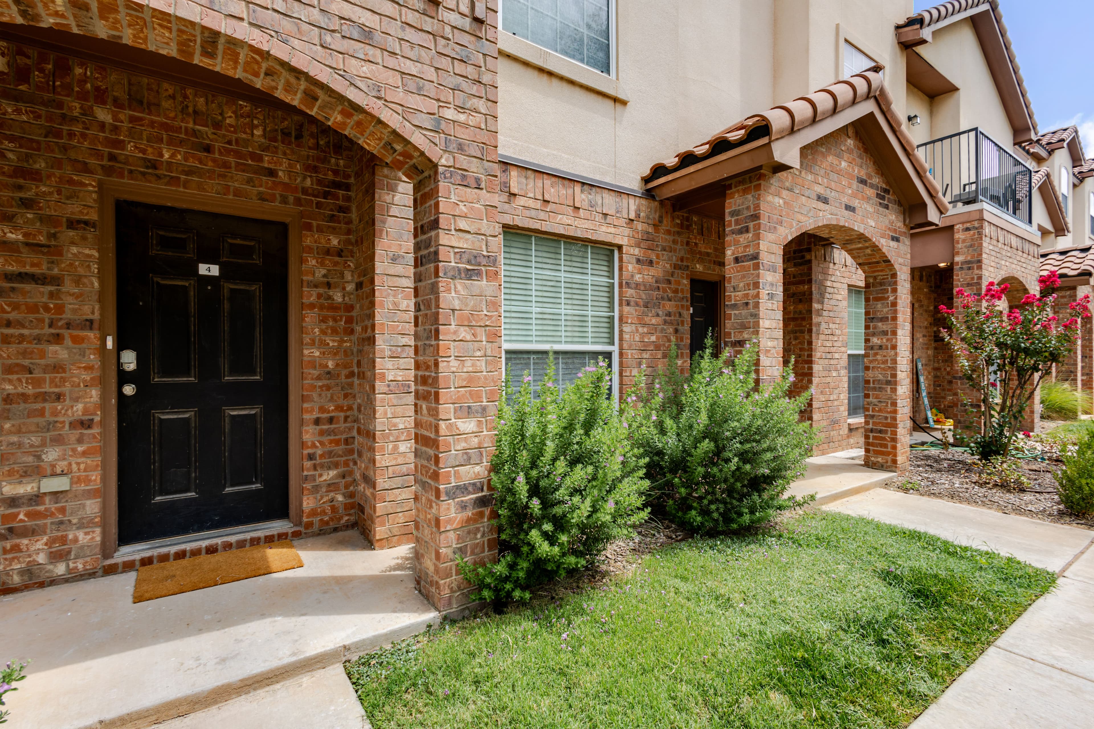 Exterior shot of front door of Main Street Airbnb Condo in Lubbock Texas