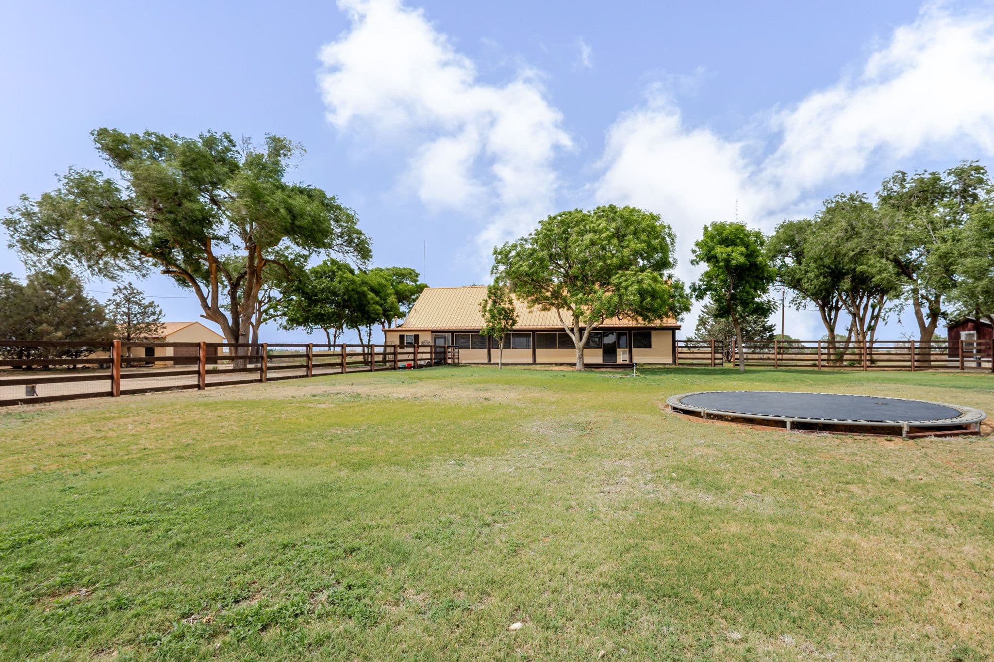 Exterior shot of back of countryside home in Clovis New Mexico