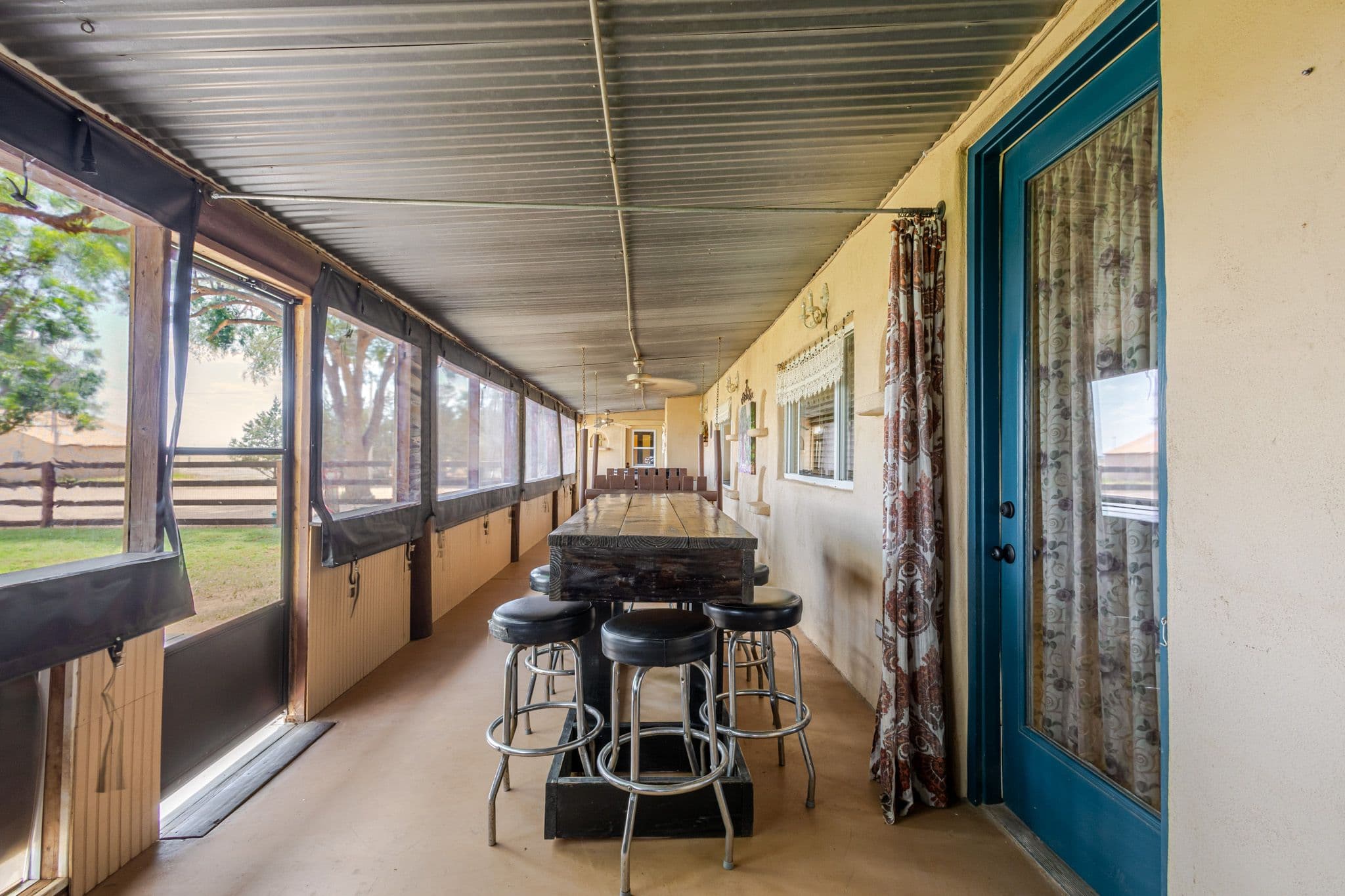 Interior shot of sunroom in back patio of countryside home in Clovis NM